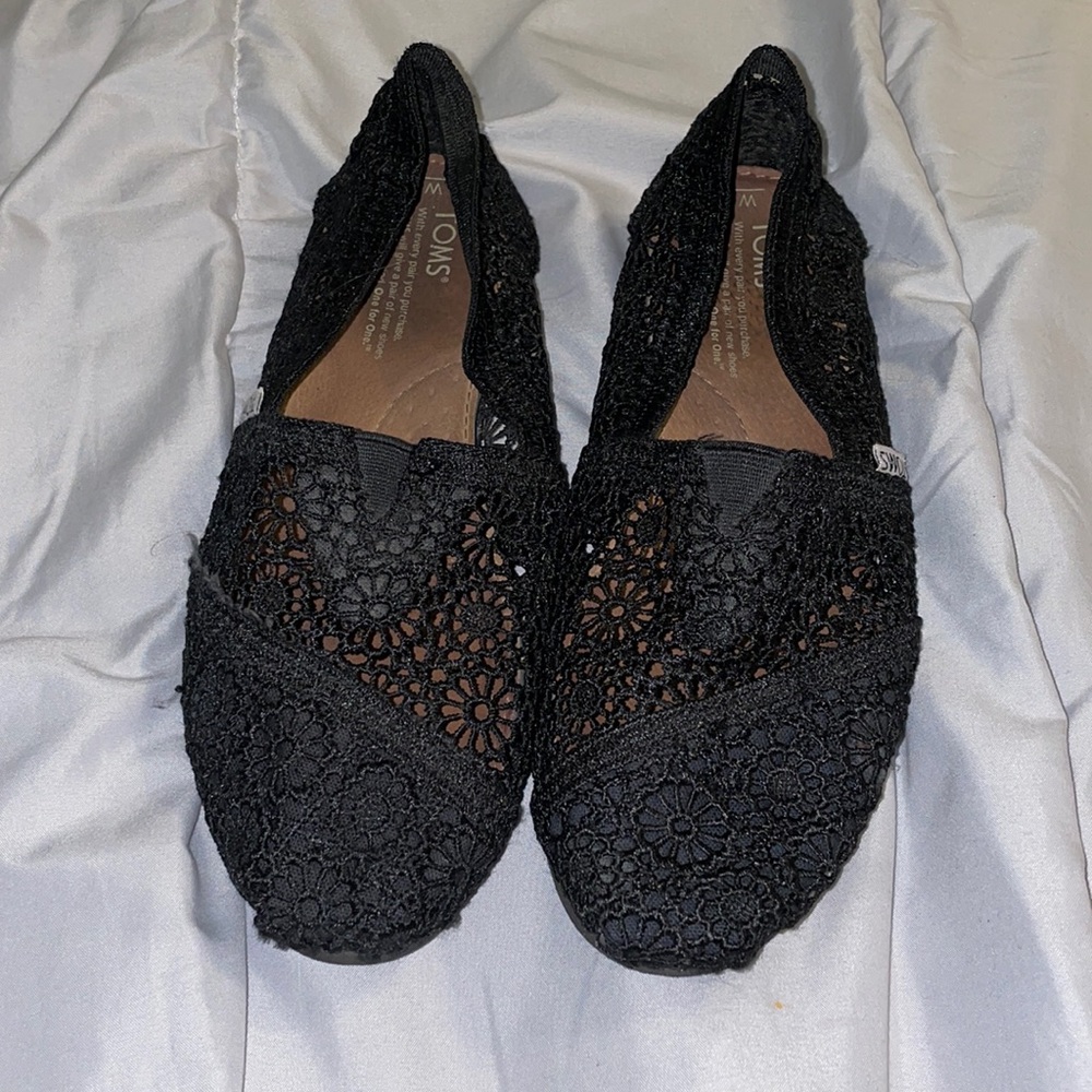 Tom’s Black Lace Slip Ons